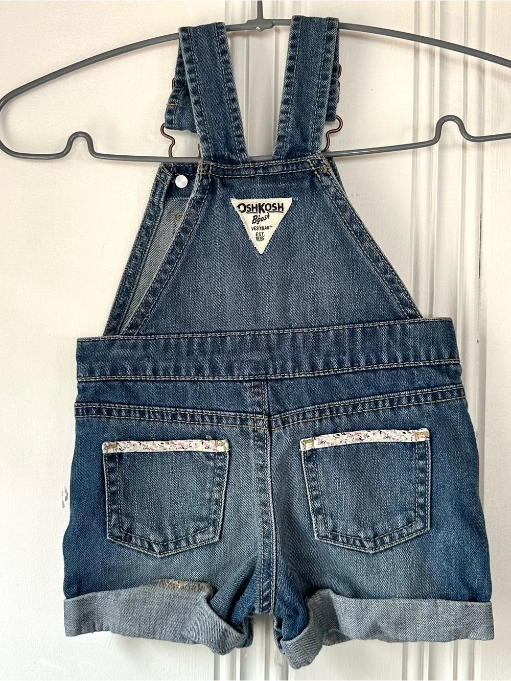 OshKosh B'gosh 12M Blue Denim Short Overalls with Floral Trim